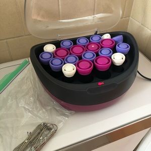 Curling rollers in a warmer